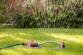 Lawn sprinkler using water